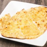 Cheese Naan · Punjabi white breed filled with cheese and baked in clay oven.