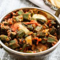 Bhindi Masala · Okra with onion, tomato, coriander power and spices.