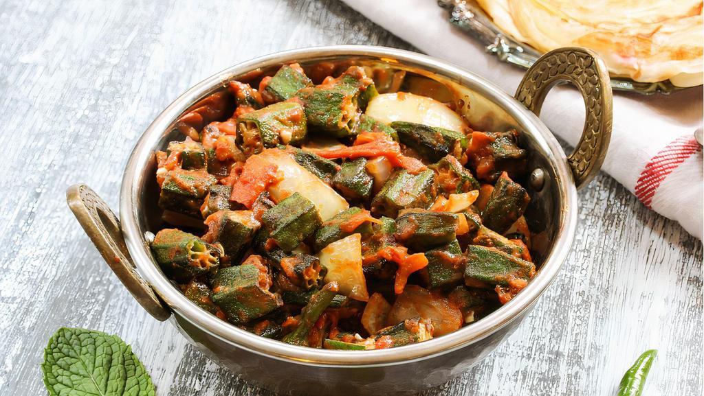Bhindi Masala · Okra with onion, tomato, coriander power and spices.