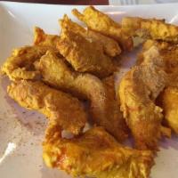 Chicken Pakora · Deep fried chicken breast fritters in spiced gram flour.