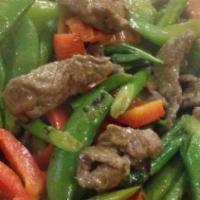 Ginger Beef · Beef sauteed with ginger, carrot, celery, onion, fresh mushrooms, green onions and garlic bl...