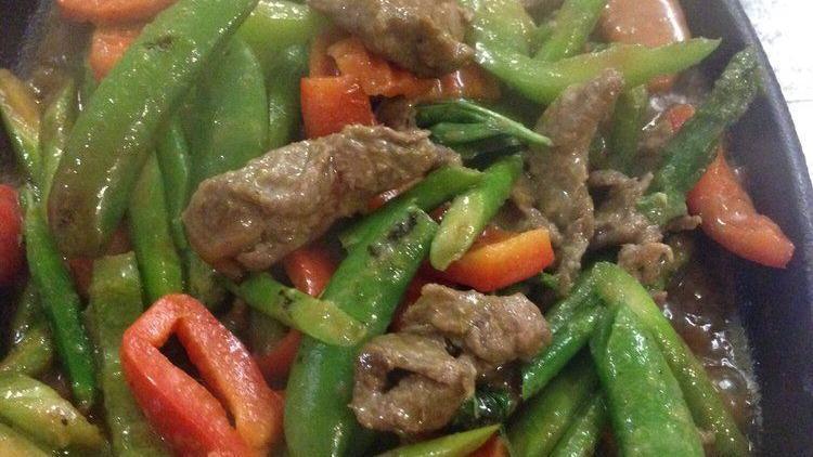 Ginger Beef · Beef sauteed with ginger, carrot, celery, onion, fresh mushrooms, green onions and garlic black bean sauce.