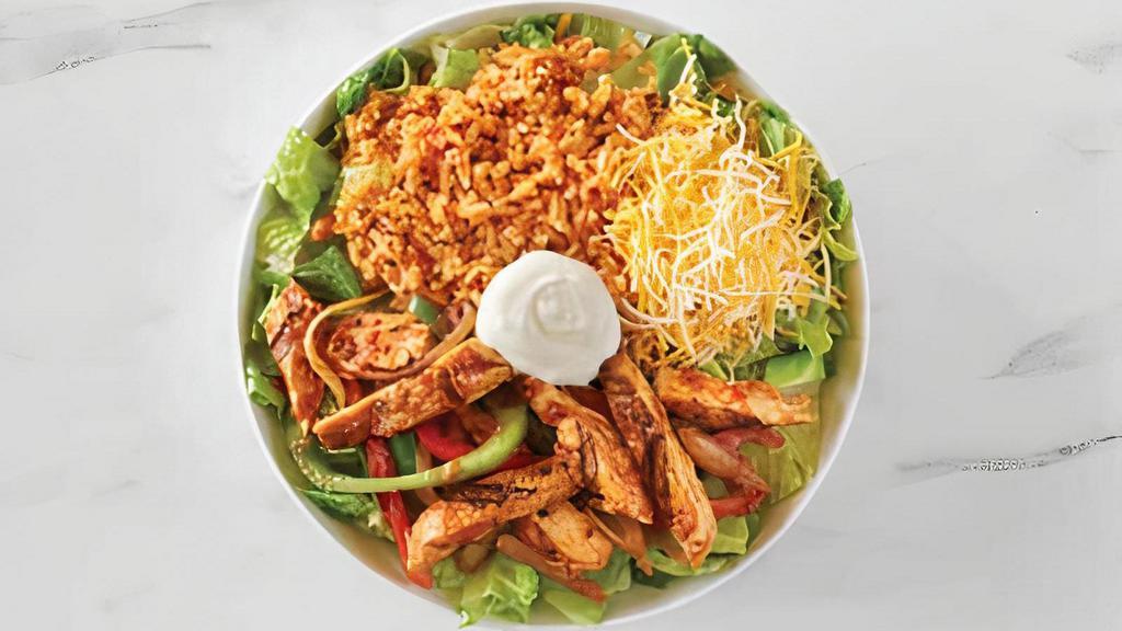 Fajita Burrito Bowl · Choice of filling sautéed with red and green bell peppers, onions, garlic and mild salsa, Spanish rice, cheese, sour cream.