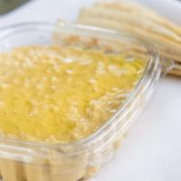 Hummus · A dip composed of chickpeas, selected Middle Eastern spices, tahini sauce, garlic, lemon jui...