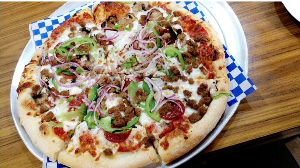 Combination Pizza · Pepperoni, salami, red onions, tomatoes, bell peppers, olives.