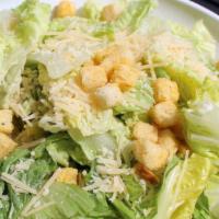 Caesar Salad · Romaine lettuce, Parmesan cheese, croutons and Caesar dressing
