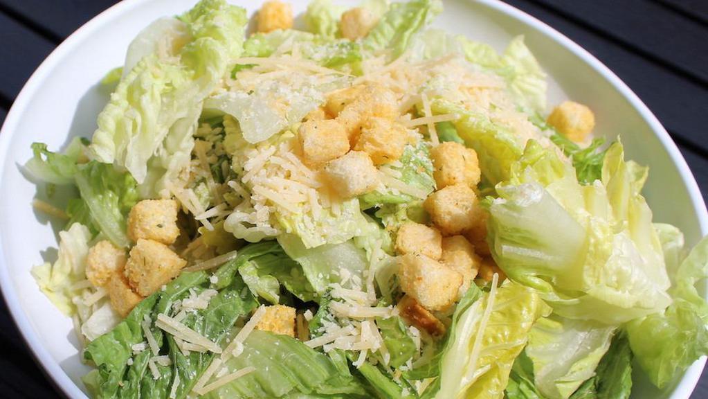 Caesar Salad · Romaine lettuce, Parmesan cheese, croutons and Caesar dressing