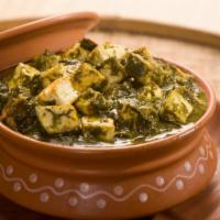 Palak Paneer · Spinach cooked with homemade cheese.