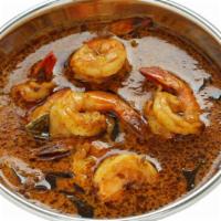 Prawn Masala · Prawn cooked in coconut and onion gravy with fresh tomatoes, Kashmiri chilies, garlic, herbs...