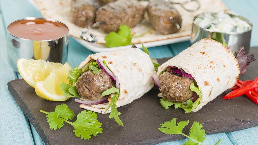 Seekh Kabab Roll · Contains minced ground beef, marinated and seasoned then charboiled on a skewer