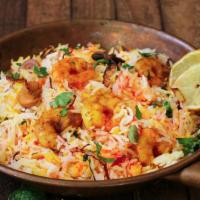 Shrimp Biryani · Shrimp cooked with aged basmati rice and combination of special spices.