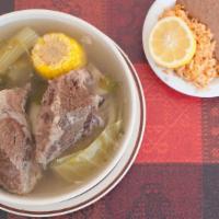 Cocido de Res · Our Famous Beef Soup. Served with rice and beans and Tortillas