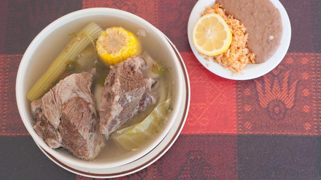 Cocido de Res · Our Famous Beef Soup. Served with rice and beans and Tortillas