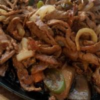 Fajitas · Your choice of Protein cooked with Peppers, Tomatoes, Onions, and Served with Tortillas.