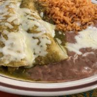 Chiles Rellenos · 2 Chiles Rellenos served with Rice, Beans, and Tortillas.