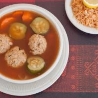 Albondigas · Mexican Traditional Meatball soup. Served with rice and Tortillas.