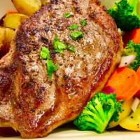 New York  Steak Box · 12 OZ New York steak with roasted potatoes and mixed cooked vegetables.