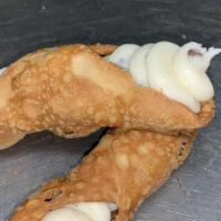 Cannoli · Two pieces of fried pastry dough, filled with a sweet, creamy filling.