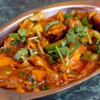 Karahi Chicken · Chicken Cooked in Deep Wok, Fresh Tomatoes, Onion, Ginger, Garlic and Spices.