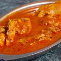 Chicken Korma (Coconut) · Chicken Cooked in Coconut Based Cream Sauce Spices.