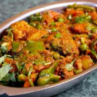 Vegetables Curry · Blend of Garden Vegetables Cooked with Fresh Herbs and Darbari Spices.
