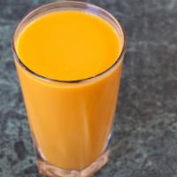 Mango Lassi · A Delicious Drink Made with Mango Pulp, Yogurt and Sugar.