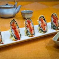 Dynamite Roll (6 pcs.) · Spicy tuna light-batter-dipped fried, with spicy, and sweet sauce on top.