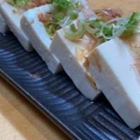 Hiyayakko · Chilled tofu topped with bonito flakes and green onion, with dashi sauce