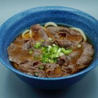 Beef Udon · Sliced rib-eye steak noodle soup.