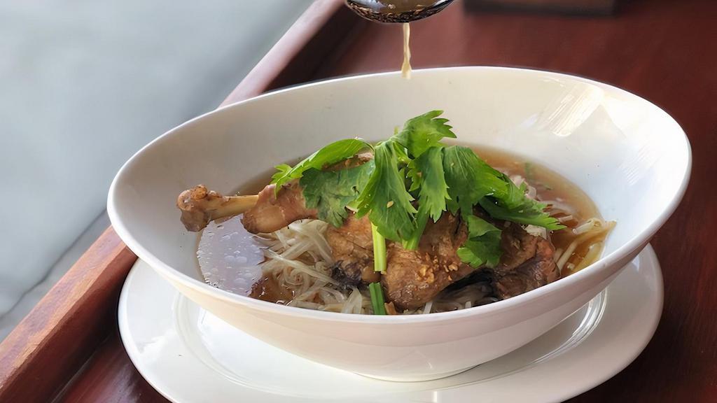 Kuay Tiew Ped Toon · Well-done braised duck in Thai special black soup.