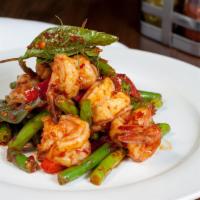 Pad Pick Khing · Sauteed house made chili paste with green bean, bell pepper and basil leaves.