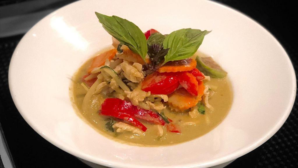 Green Curry · Coconut green curry with vegetables and basil.