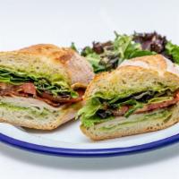 The Mix · Deli sliced turkey, bacon, tomato and mixed greens on baguette with a green goddess spread. ...