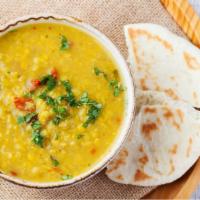 Lentil Soup with Pita Bread · Fresh warm mediterranean style soup served with pita bread