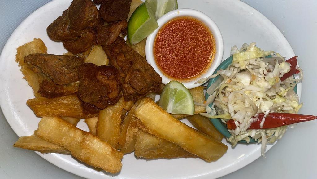  - Yuca Frita · Fried crispy pork and fried crispy cassava. Served with pickled cabbage and fresh tomato sauce.