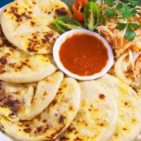  - Revuelta · 1 Fresh handmade tortilla stuffed with cheese, beans, roasted pork
All pupusa served with pi...