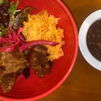 Fried Carnitas Bowl · Fried Carnitas, rice, black or pinto beans, avocado, organic mix greens, spicy pickled onions.
