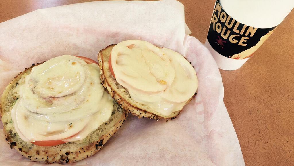 Tuna Melt · served open-faced; Tuna salad topped with red onion, tomato and Provolone cheese.