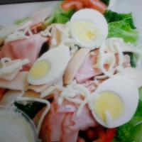 Shef's Salad · Ham, turkey, hard-boiled egg, lettuce, tomato cucumber cheese and croutons.