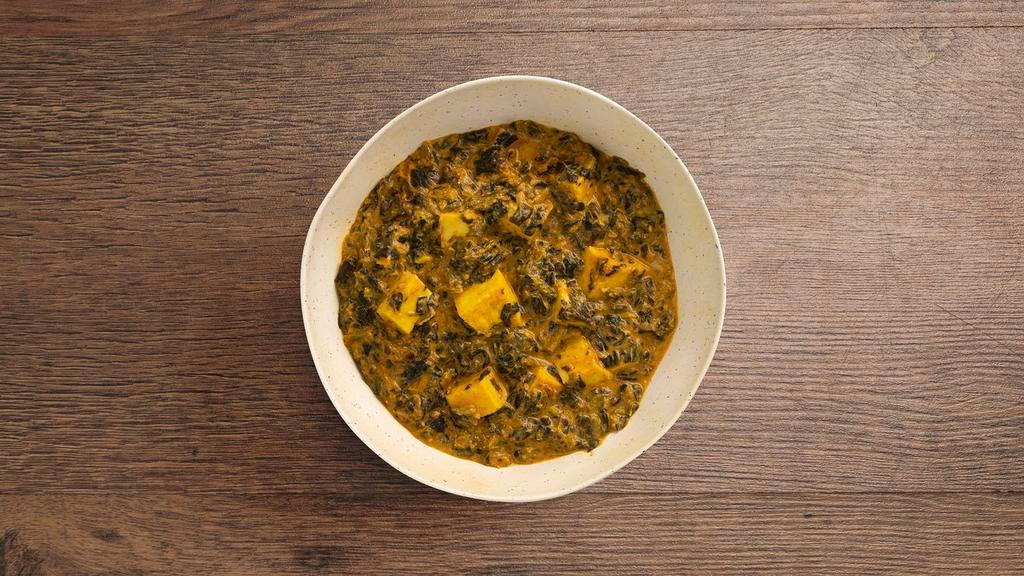 Saag Paneer · Indian paneer cheese cooked with spinach and light spices.