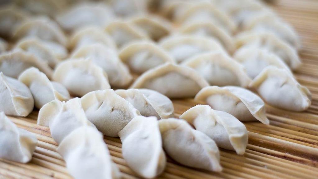 A16. Tianjin-Style Steamed Pork Baos (3 Pieces) / 天津狗不理包子 · 