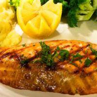 Tilapia · With lemon-shrimp sauce, served with vegetables.