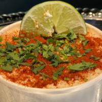 Street-Style Elote Cup · Vegetarian. Corn Niblets, Chipotle Pepper Cream Sauce, Chili Powder, Paprika, Cotija, Cilant...