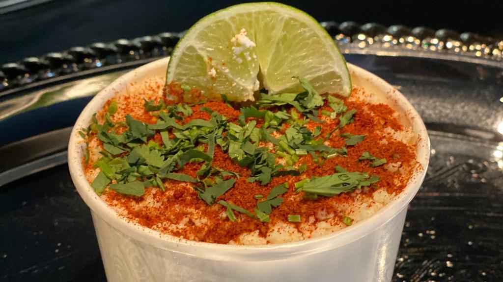 Street-Style Elote Cup · Vegetarian. Corn Niblets, Chipotle Pepper Cream Sauce, Chili Powder, Paprika, Cotija, Cilantro, Lime