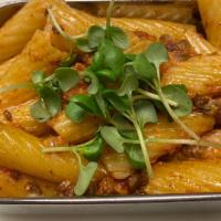 Beyond Bolognese · Vegetarian. Rigatoni, Tomato Bolognese Sauce with plant-based, ground Beyond meat, Onions, G...