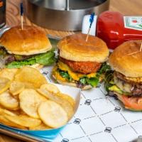 Duo Burger · Two burgers. Includes Roma tomato, leaf lettuce, shaved onions, pickles, American cheese and...