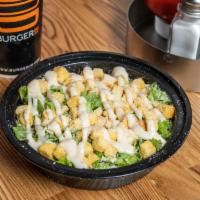 Caesar Salad · Large. Green leaf lettuce, croutons, Parmesan cheese served with caesar dressing.