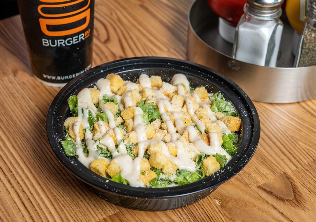 Caesar Salad · Green leaf lettuce, croutons, Parmesan cheese served with caesar dressing.