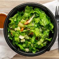 Burgerim House Salad · Green leaf lettuce, Diced tomatoes, Cucumbers & Onions served with Balsamic dressing.