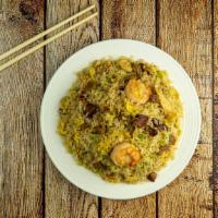 House Fried Rice                      招牌炒饭 · With chicken, pork, shrimp, beef.